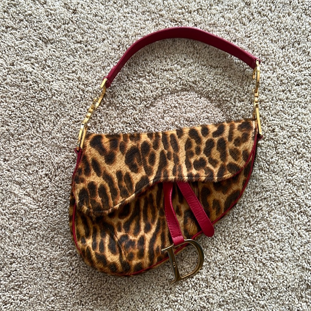 Dior pony hair saddle bag ,leather straps , the letter D on strap gold hardware